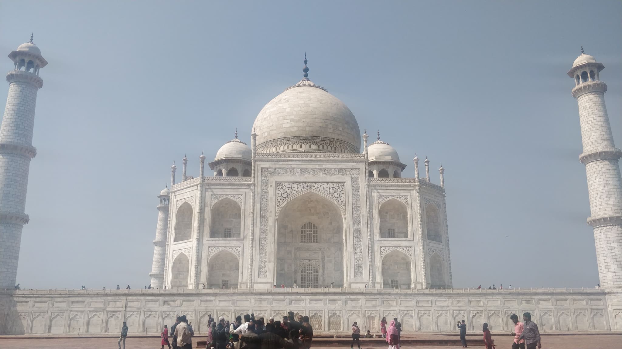 Taj Mahal front view with visitors below